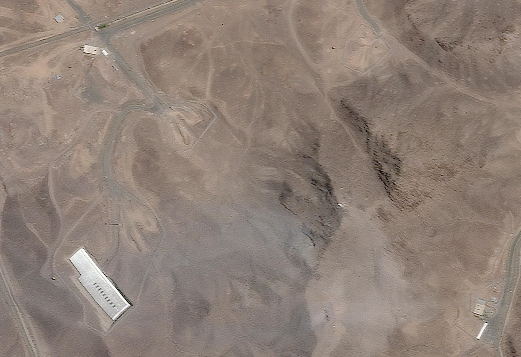 Imatge de satèl·lit de la instal·lació nuclear iraniana de Fordow després de l'atac dels EUA Imatge de satèl·lit de la instal·lació nuclear iraniana de Fordow després de l'atac dels EUA