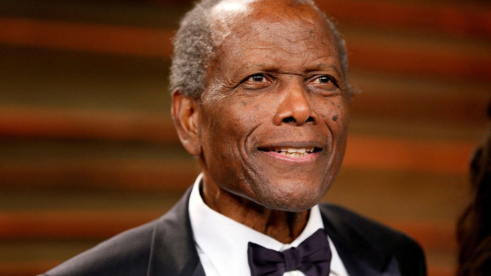 L'actor Sidney Poitier en la gala dels Oscars de 2014 L'actor Sidney Poitier a la gala dels Òscar de 2014