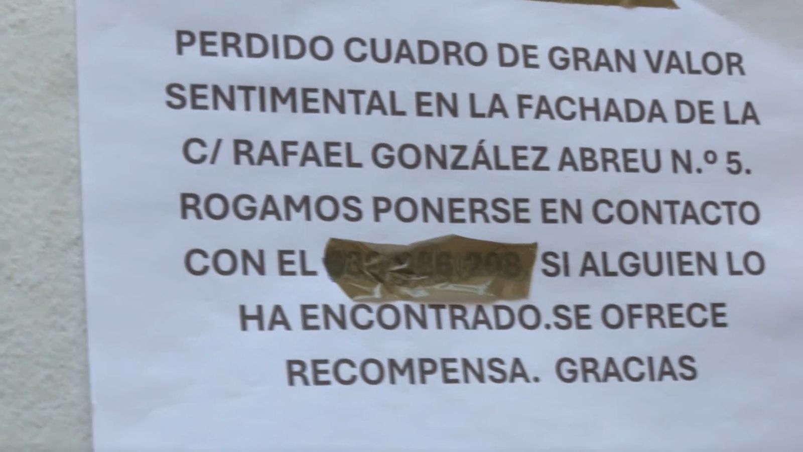 Cartell col·locat pels propietaris del quadre de Sorolla al centre de Sevilla