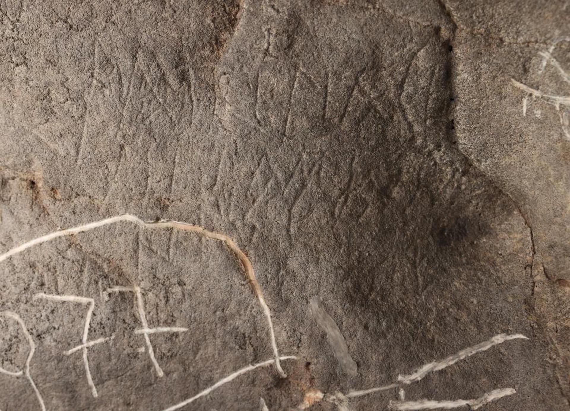 Inscripcions romanes trobades a 200 metres de profunditat de la cova de les Dones Inscripcions romanes trobades a 200 metres de profunditat de la cova de les Dones