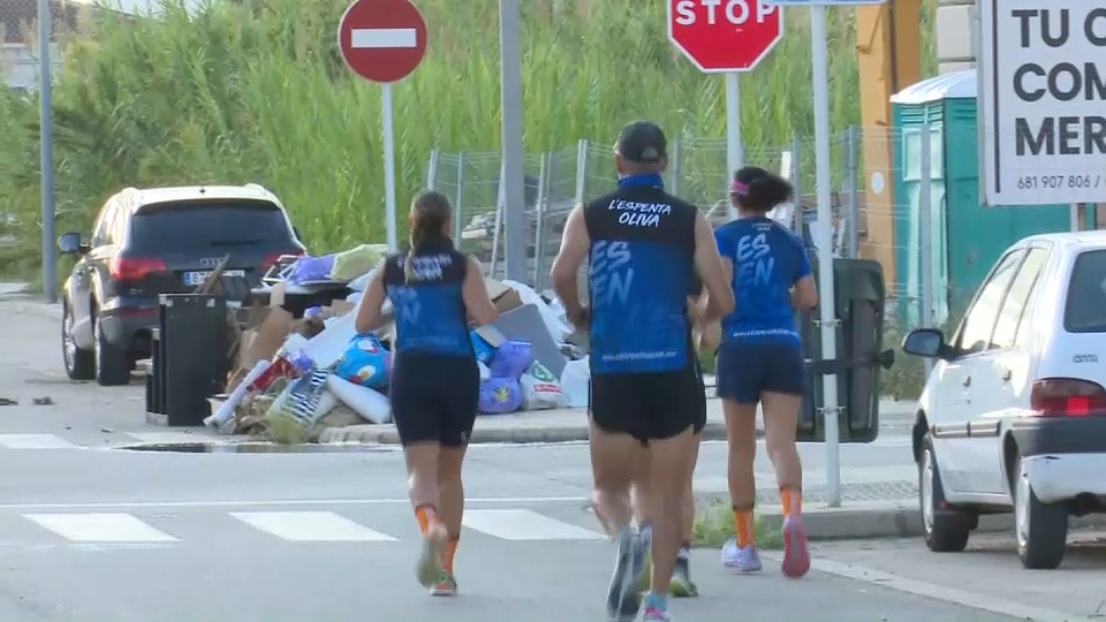 Imatge de corredors entrenant per a la Mitja Marató