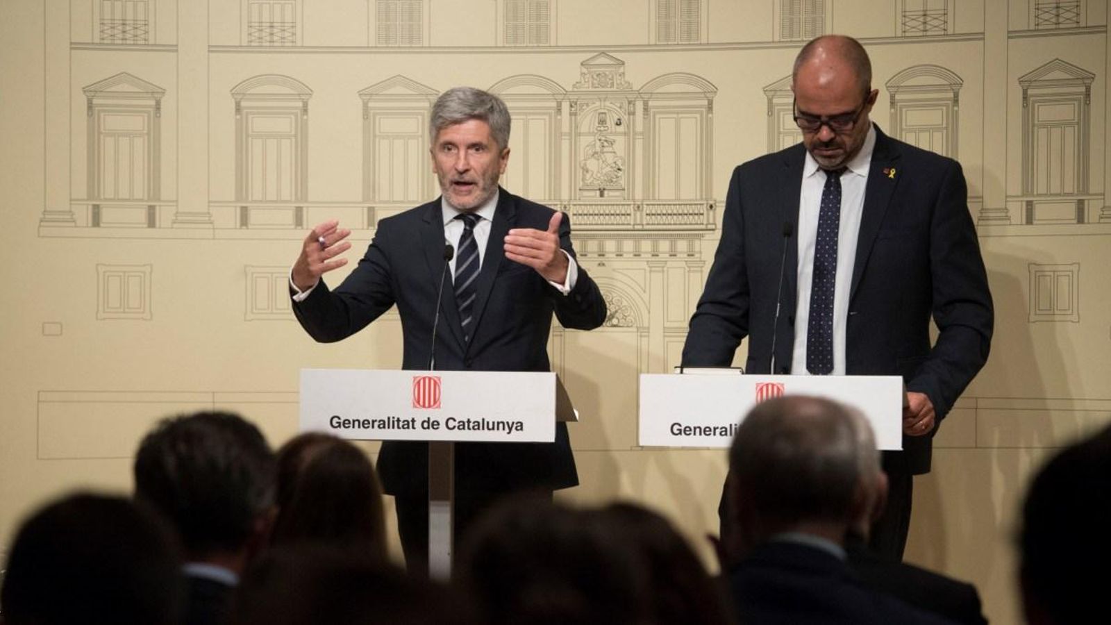 El ministre de l'Interior, Fernando Grande-Marlaska (esquerra) i el conseller d'Interior de la Generalitat de Catalunya, Miquel Buch (dreta)
