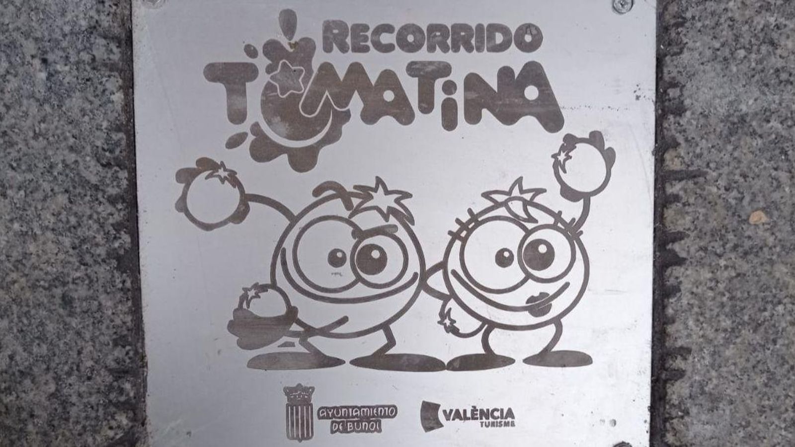 Una de les plaques de la Tomatina