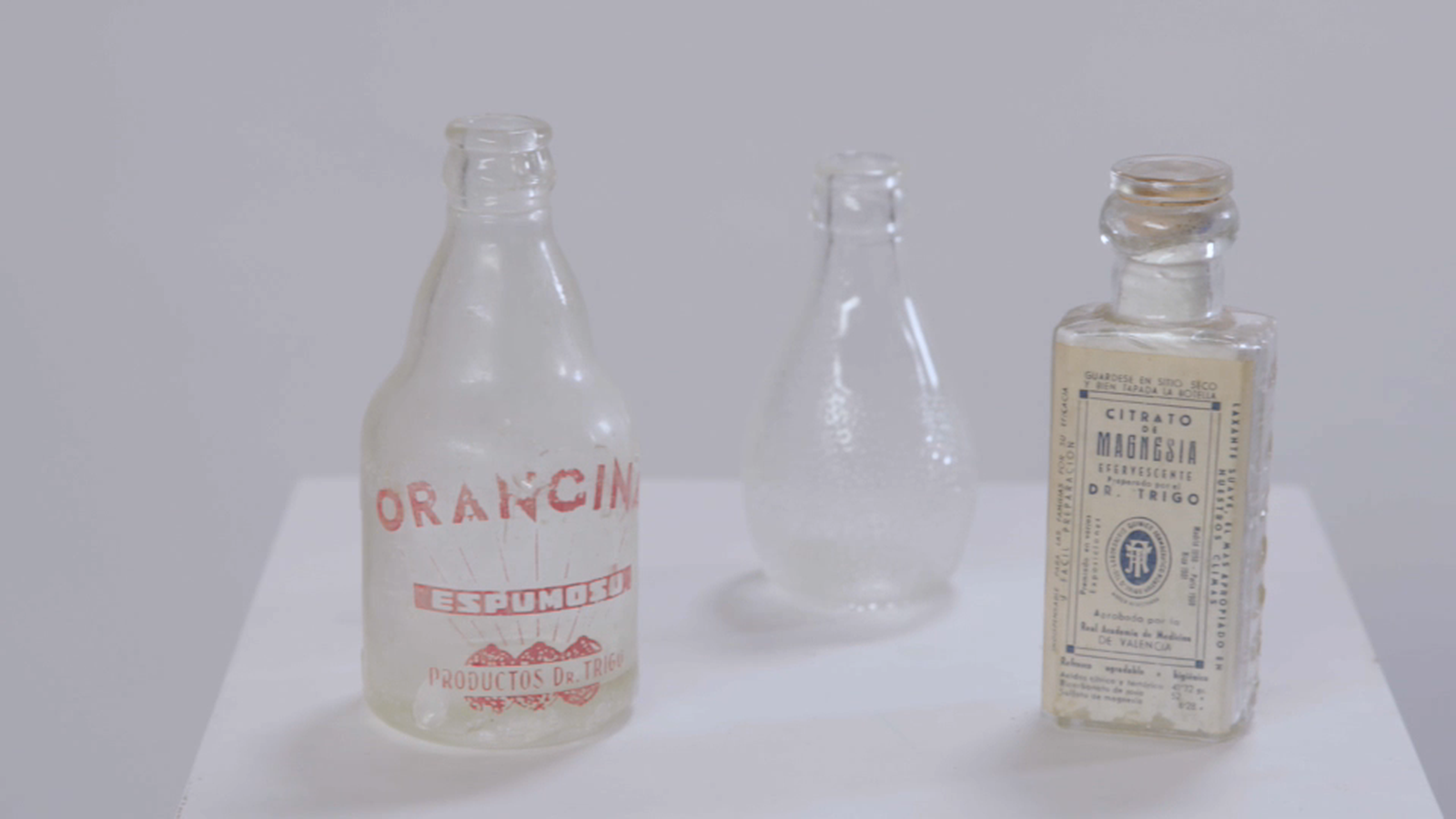 Orangina, citrat de magnèsia i una de les primeres ampolles d'Orangina