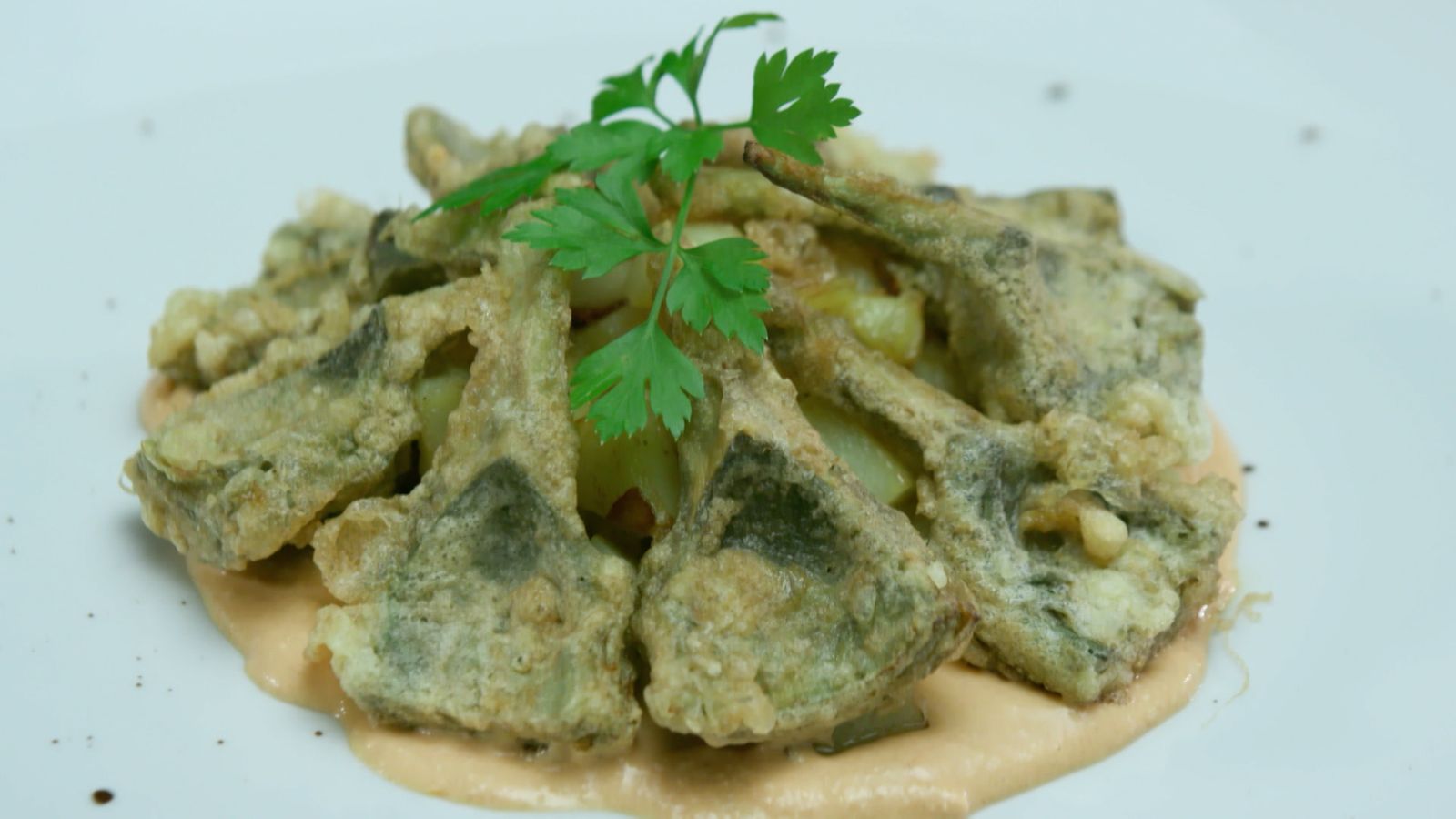 Carxofes amb romesco i creïlles de pastor