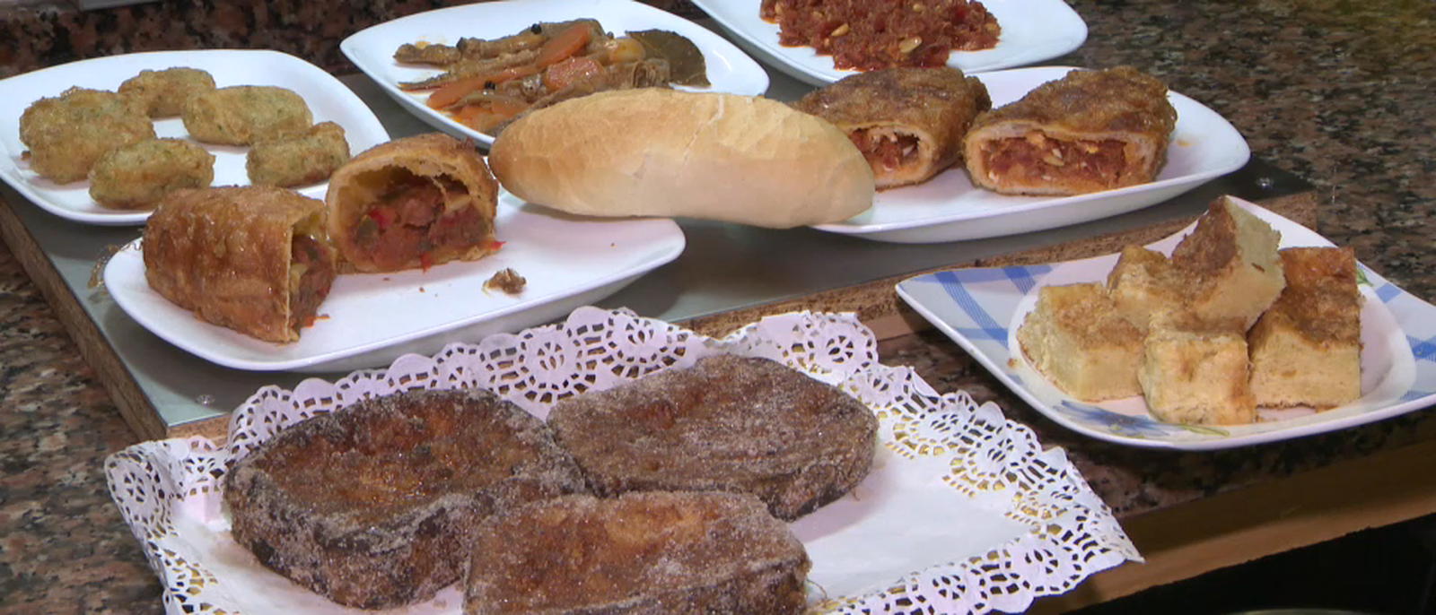 Titaina, Mandonguilles d’abadejo, sardines en escabetx, pepitos farcits de Titaina i llesques d'ou als poblats maritims de València