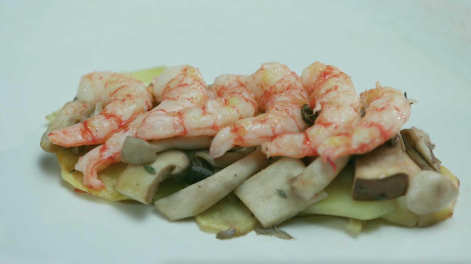 Papillota de bolets i gambes