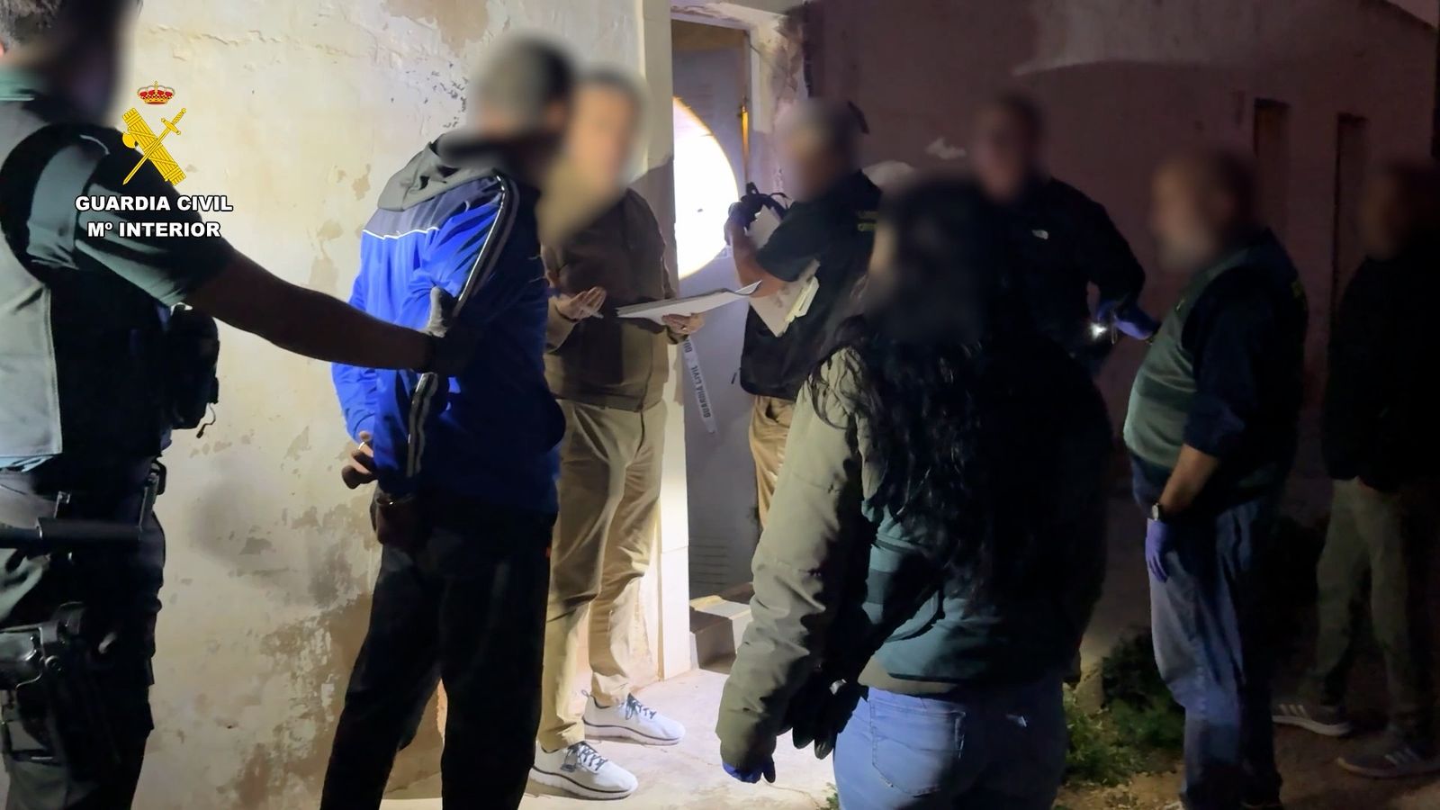 El detingut, durant la reconstrucció del crim