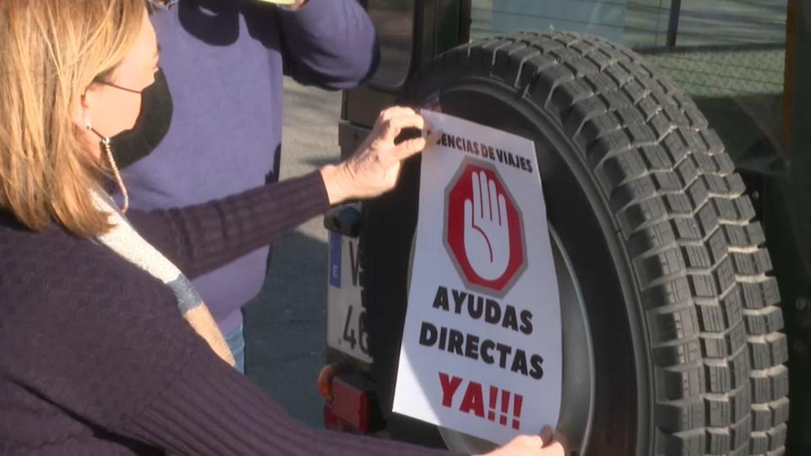 Un dels cartells de la marxa de protesta de les agències de viatge