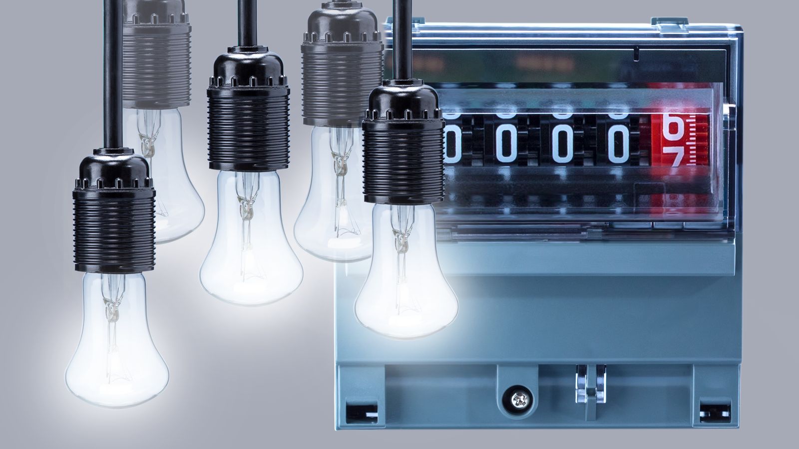 Bombetes i comptador de llum, en una imatge d'arxiu