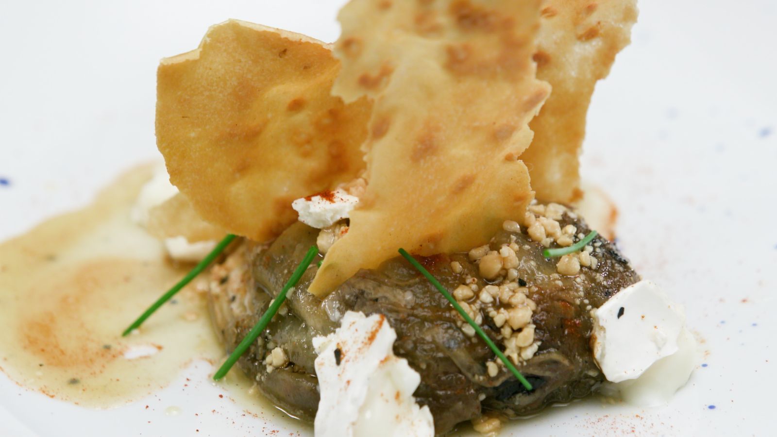 Albergina amb formatge i mel de cacauets