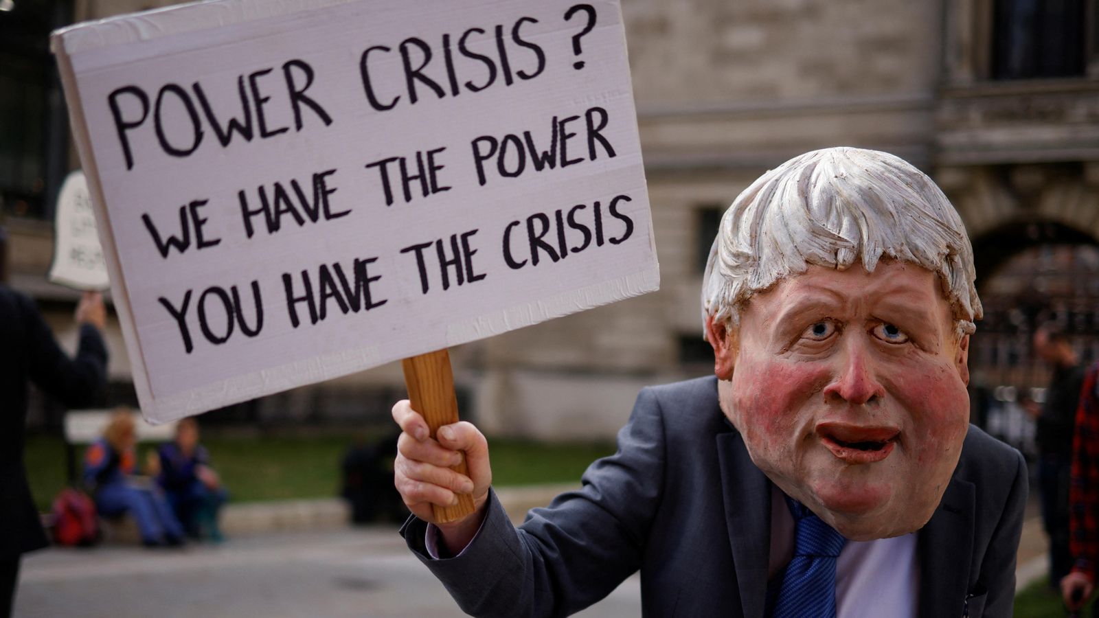 Un activista protesta amb una careta de Boris Johnson a Londres