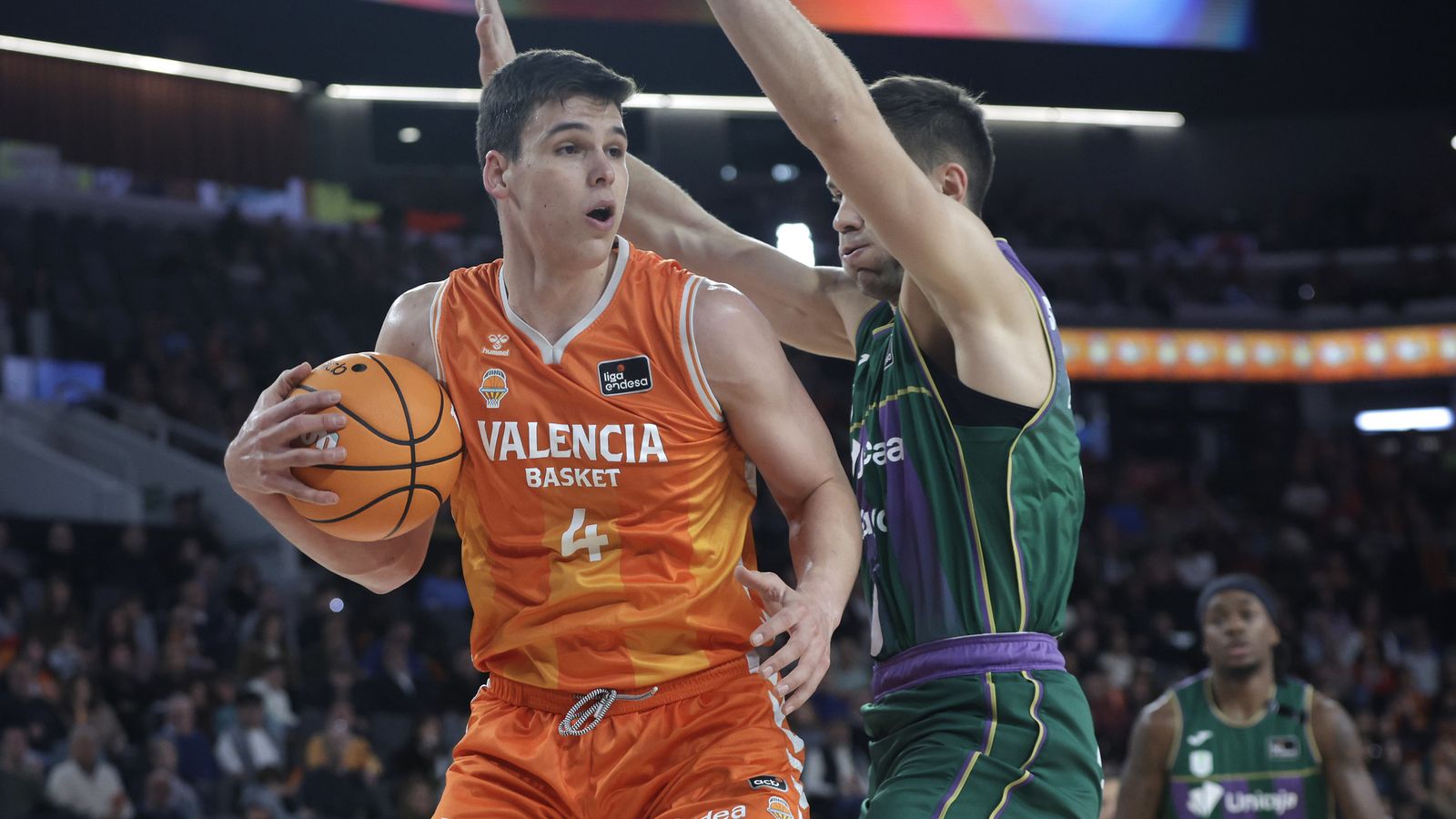 Jaime Pradilla, defensat per un jugador de l'Unicaja