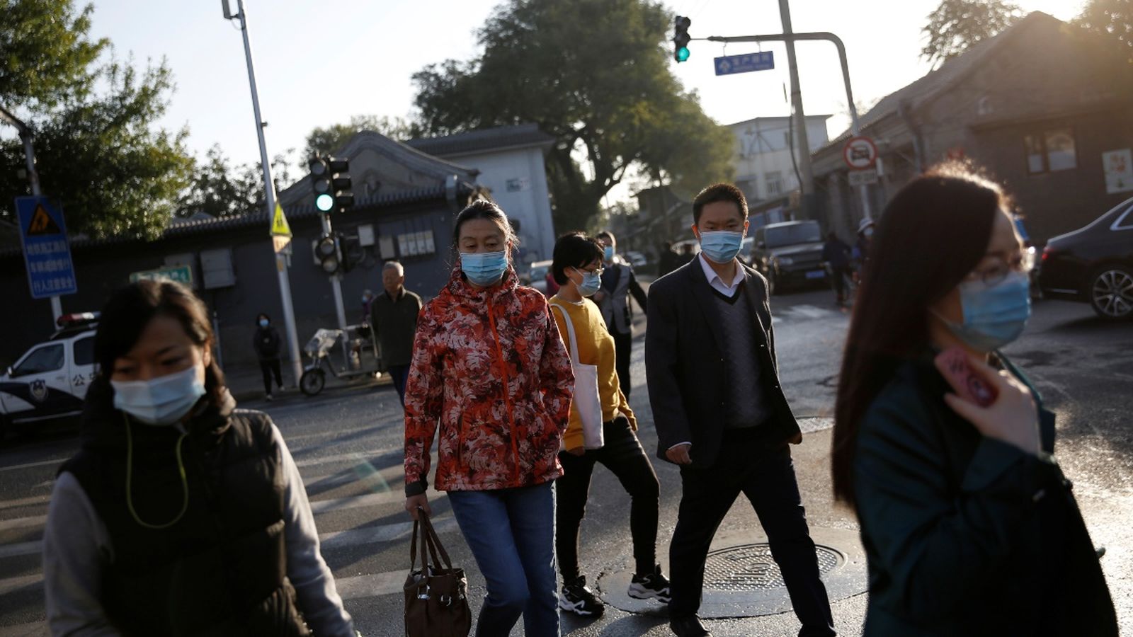 Persones amb mascareta als carrers de Pequín