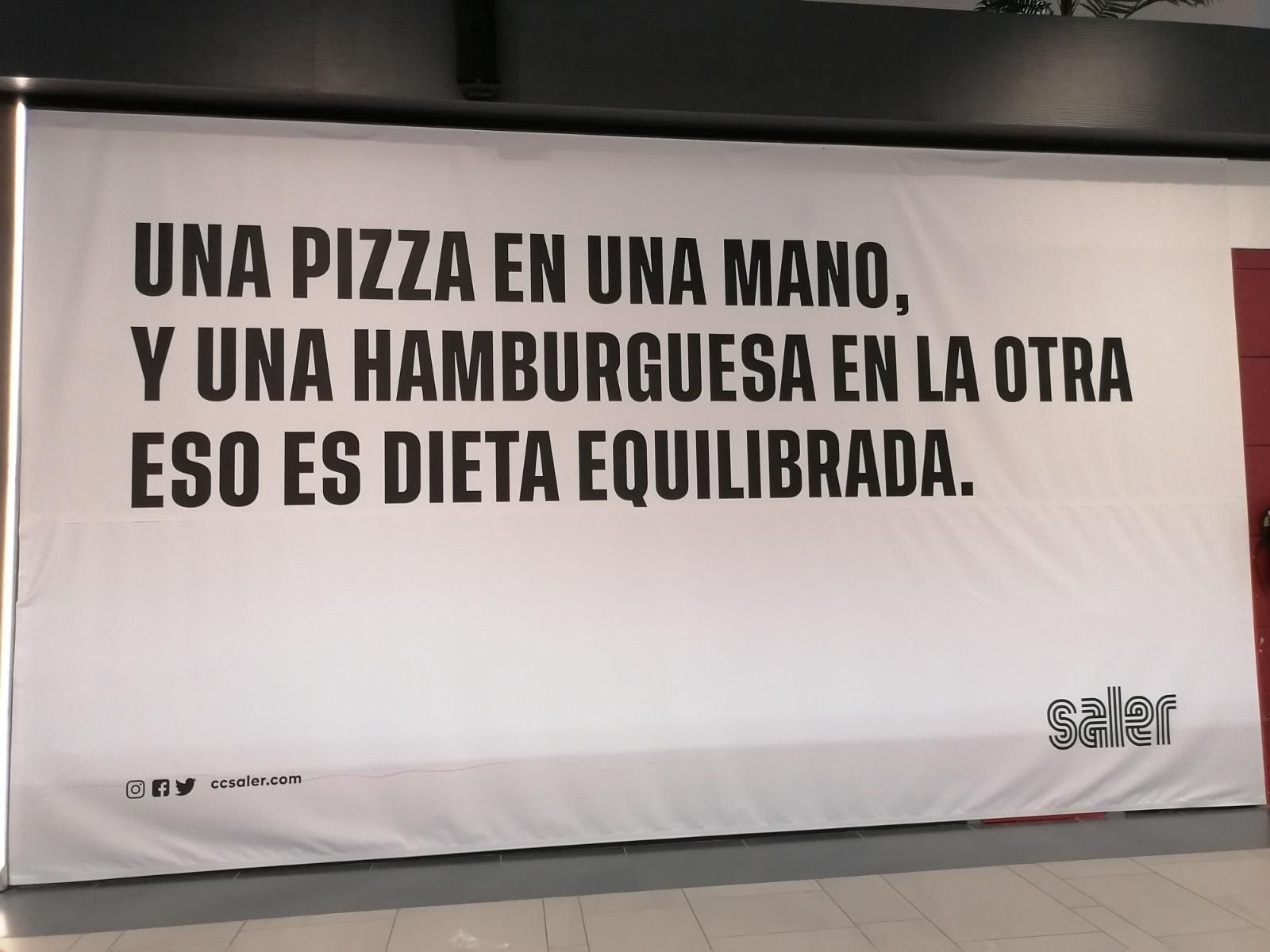 Cartell de la polèmica al Centre Comercial El Saler de València