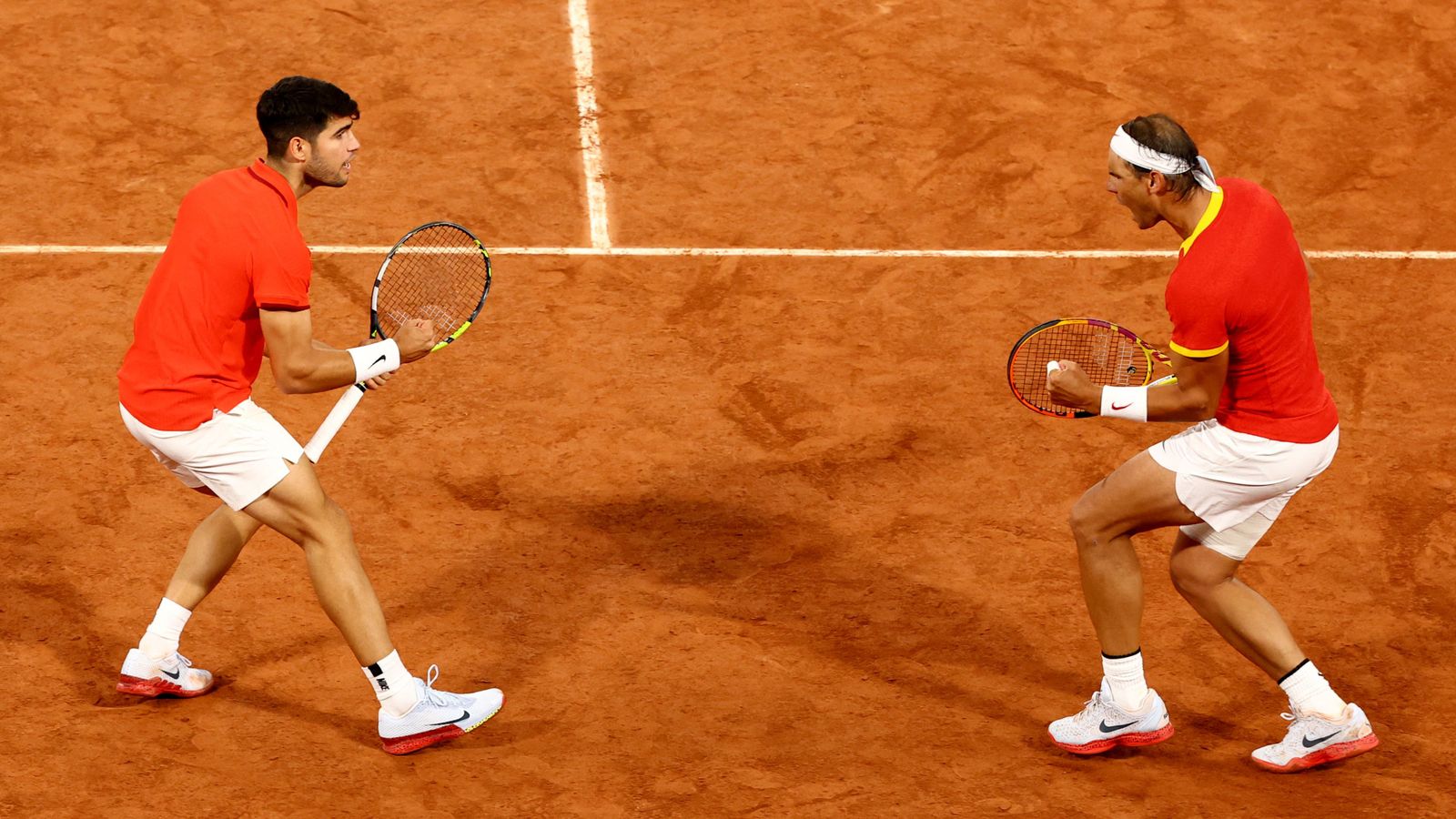 Alcaraz i Nadal celebren un punt