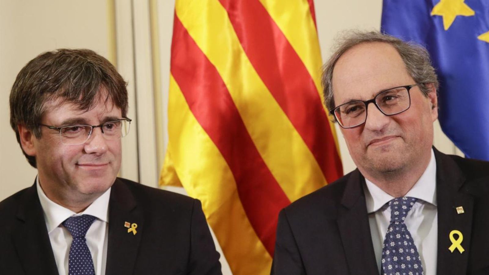 Carles Puigdemont i Quim Torra, durant la conferència de Brussel·les