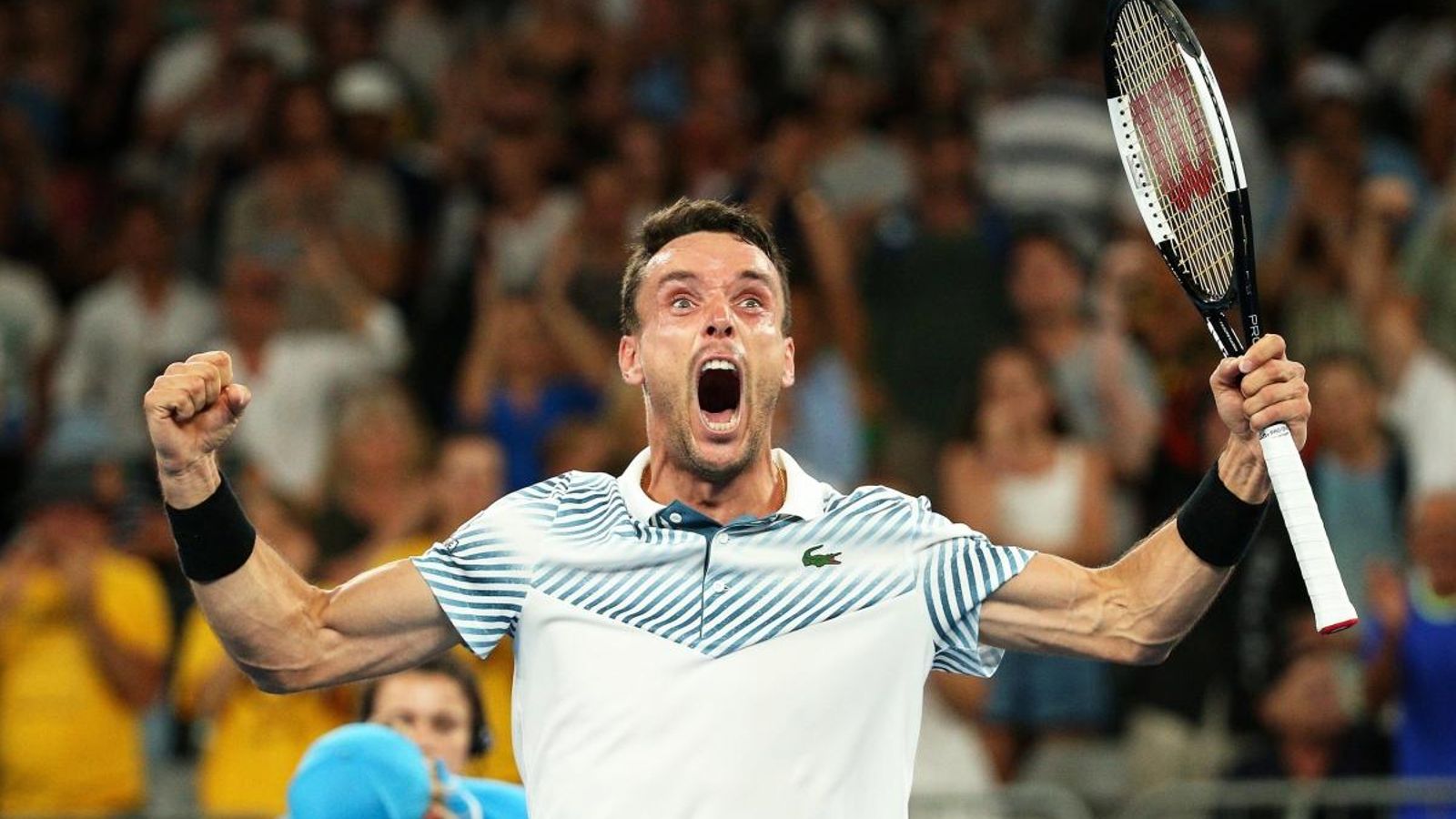 Roberto Bautista celebra la seua victòria davant Millman