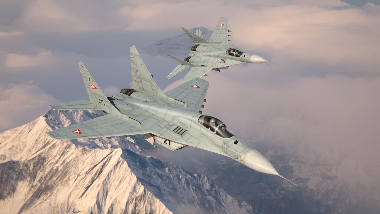 Dos avions de combat militars MiG-29 volant sobre els núvols