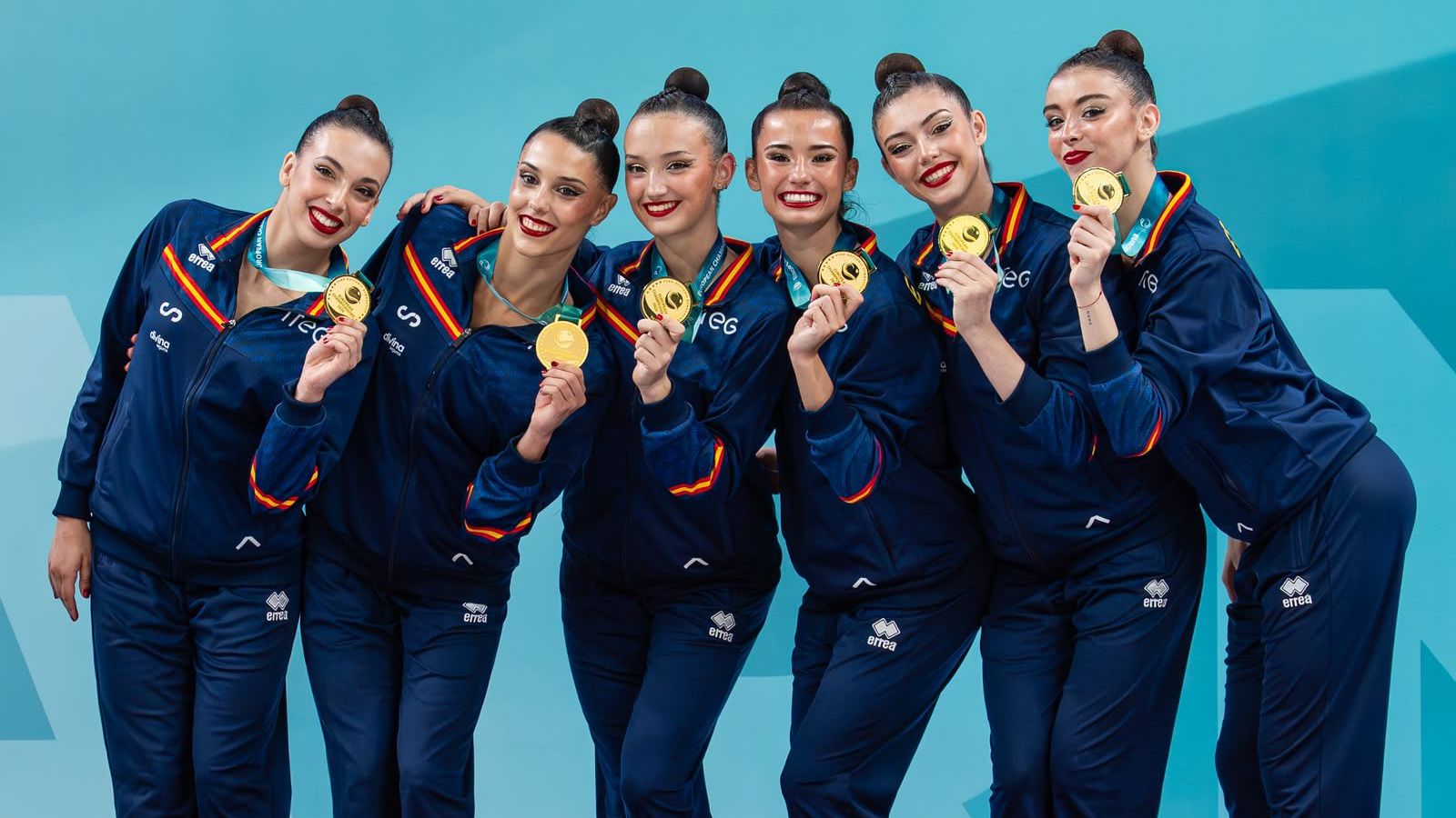 Les integrants de l'equip espanyol, amb les medalles d'or