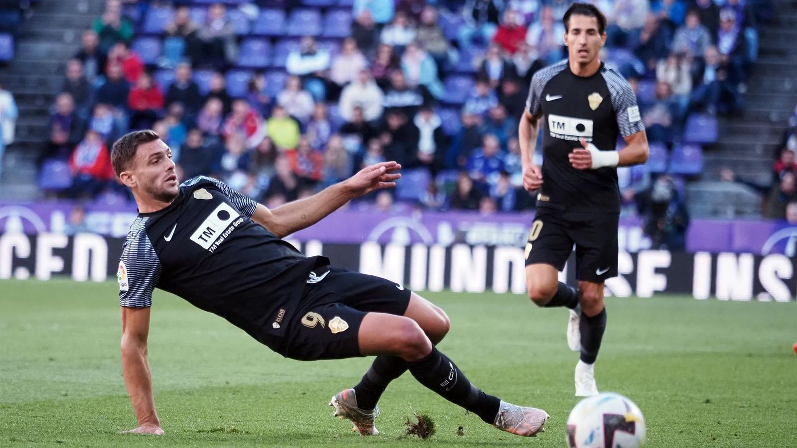 Boyé i Pere Milla, en una acció del partit