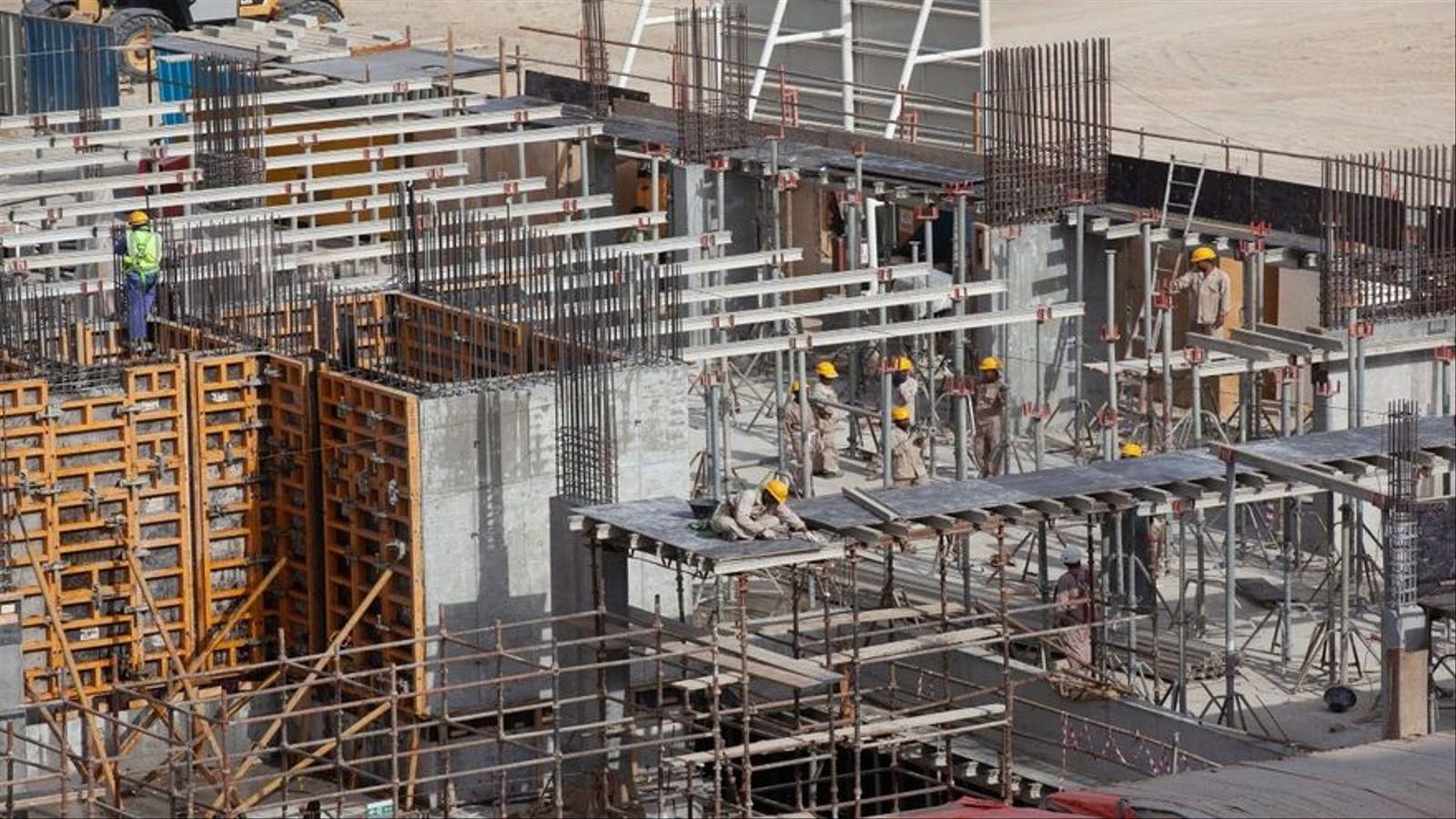 Obrers treballant en una construcció